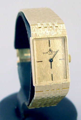 Appraisal: VINTAGE 'S BAUM MERCIER GOLD WRISTWATCH K yellow gold gent's