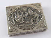 Appraisal: A Chinese white metal tests silver box the hinged lid