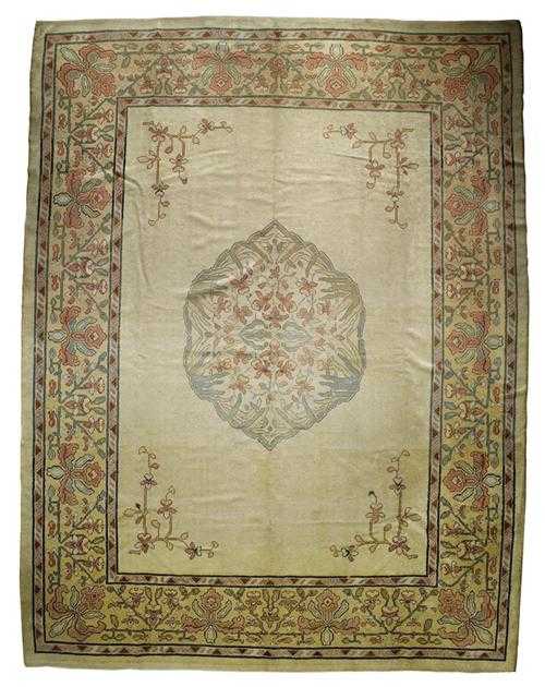 Appraisal: EUROPEAN ART NOUVEAU CARPET ca Beige central field with a