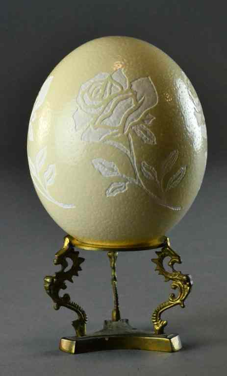 Appraisal: Ostrich Egg Etched with Floral DesignHollow egg etched on all