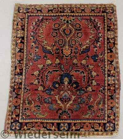 Appraisal: Sarouk oriental mat with a red field and floral patterns