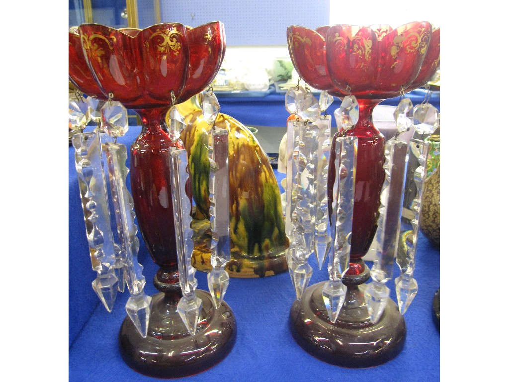 Appraisal: Pair of ruby glass lustres with gilt decoration to top