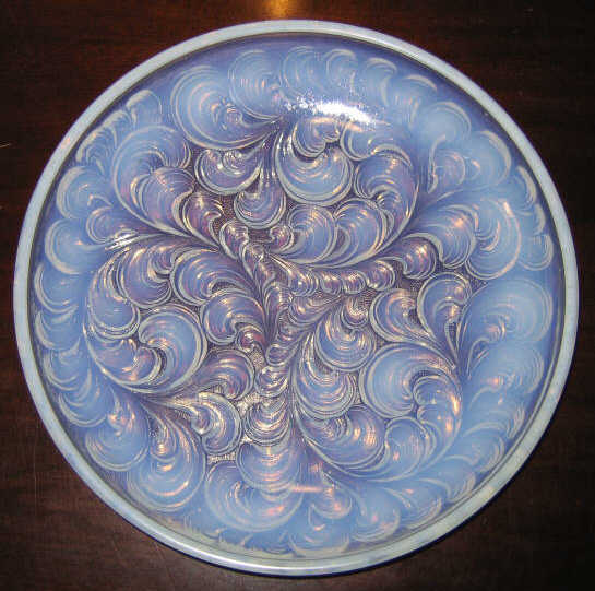 Appraisal: MANNER OF LALIQUE Blue opalescent shallow bowl with foliate decoration