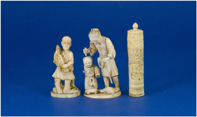 Appraisal: Three Japanese Ivory Figures Man and boy man carrying a