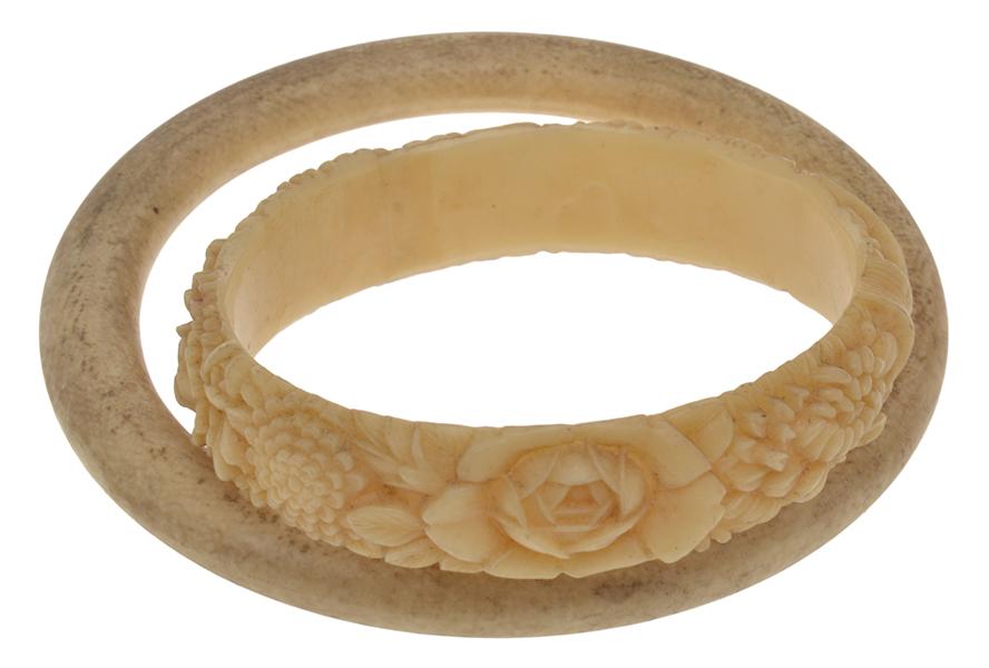 Appraisal: LARGE IVORY BANGLE TOGETHER WITH A CELLULOID BANGLE