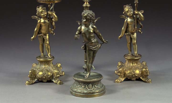 Appraisal: Monumental Bronze-Finished Amorino Table Lamp in the Louis XVI taste