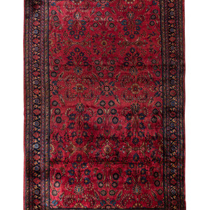 Appraisal: A Sarouk Wool Rug Circa feet inches x feet inches