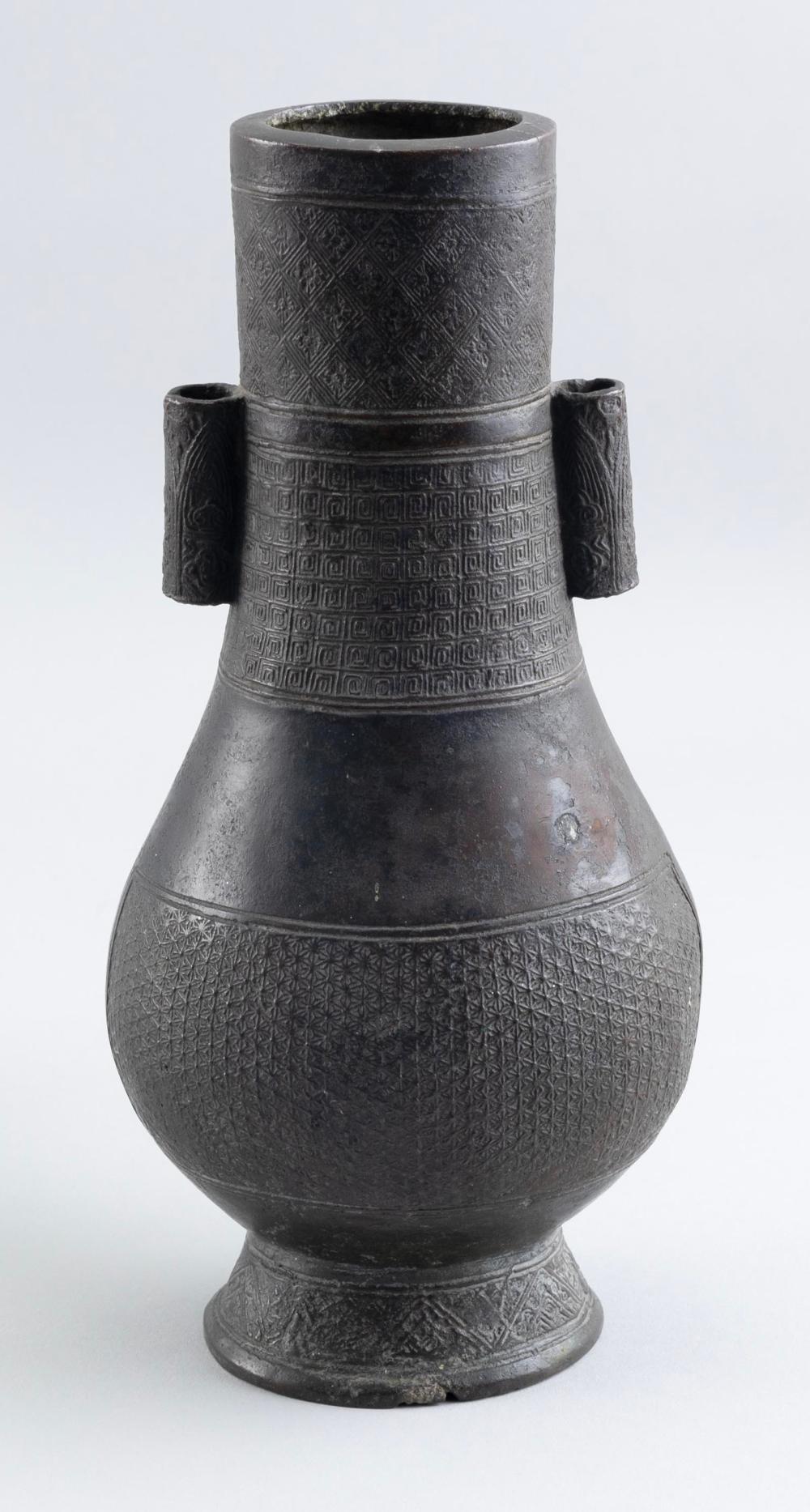 Appraisal: CHINESE ARCHAIC BRONZE HU-FORM VASE HEIGHT CHINESE ARCHAIC BRONZE HU-FORM