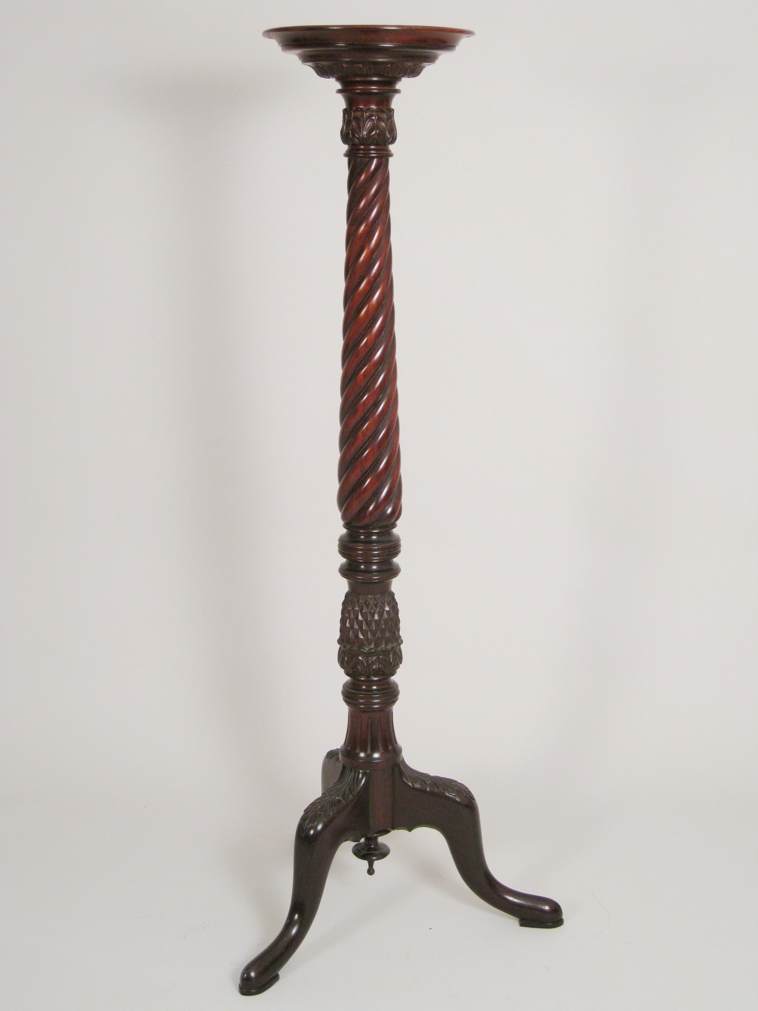 Appraisal: A th Century mahogany Torchere with dished circular top on