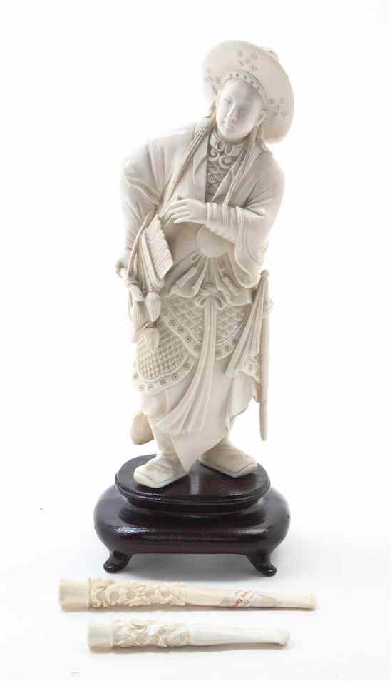 Appraisal: A Chinese Carved Ivory Figure depicting a young man with