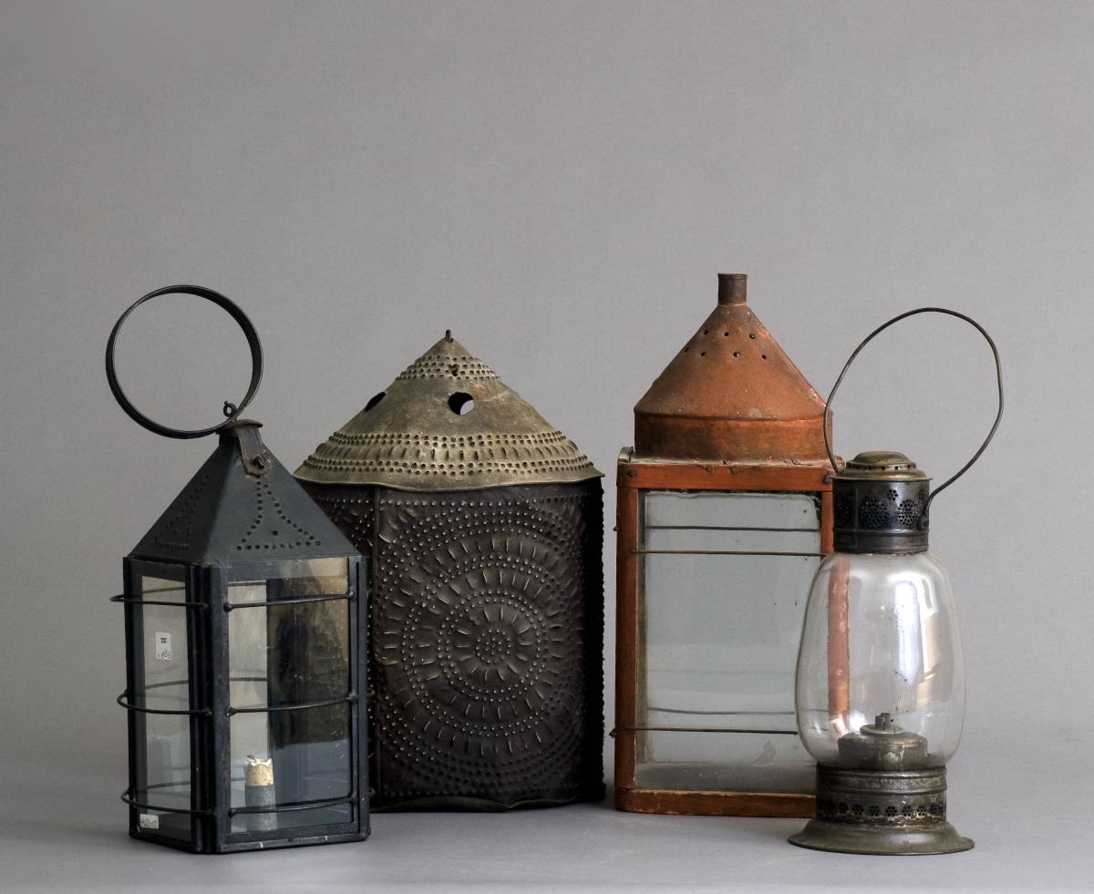 Appraisal: FOUR EARLY AMERICAN TIN AND GLASS LANTERNS INCLUDING A PUNCHED