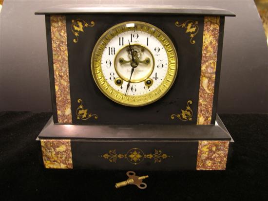 Appraisal: French stone mantle clock c finished in Paris sold by