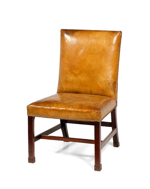 Appraisal: A GEORGIAN MAHOGANY LIBRARY CHAIR with brown leather upholstery to