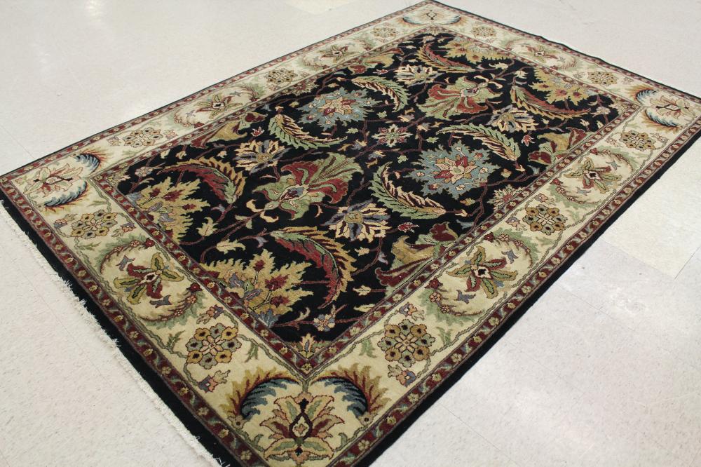 Appraisal: HAND KNOTTED ORIENTAL CARPET Indo-Persian overall leaf and palmette design