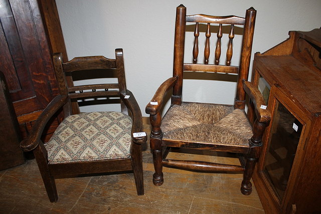 Appraisal: A CHILD'S ELM SPINDLE BACK CHAIR with rush seat and