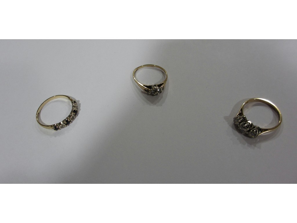 Appraisal: Lot comprising nine carat gold sapphire and diamond half hoop