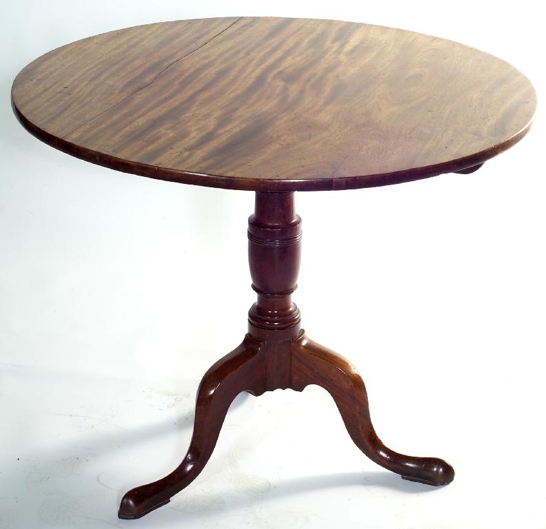 Appraisal: GEORGE III MAHOGANY TRIPOD TABLE the attractively faded circular top