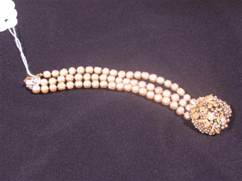 Appraisal: MIRIAM HASKELL STYLE FAUX PEARL BRACELET With elaborate clasp the