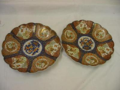 Appraisal: A PAIR OF IMARI PORCELAIN CHARGERS of lobed circular form