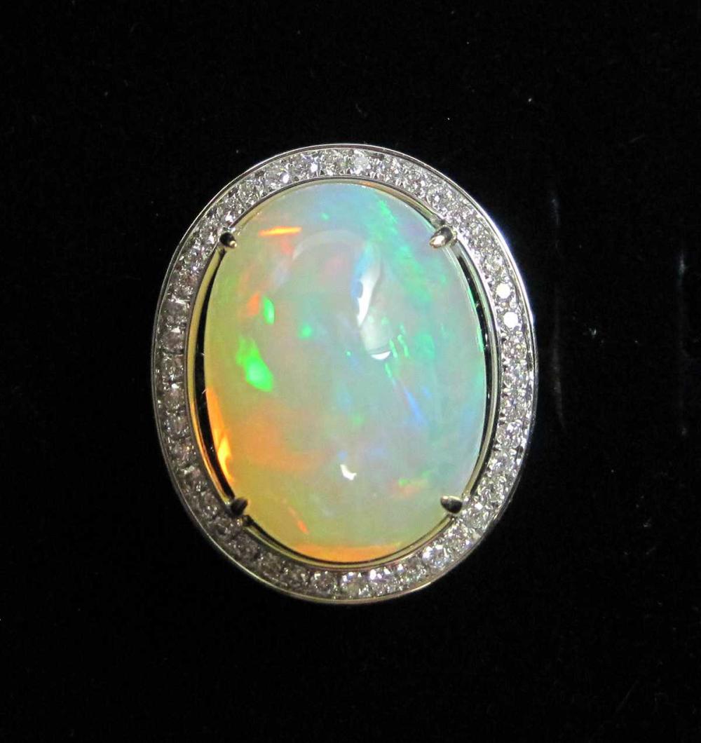 Appraisal: OPAL DIAMOND AND FOURTEEN KARAT GOLD RING The k white