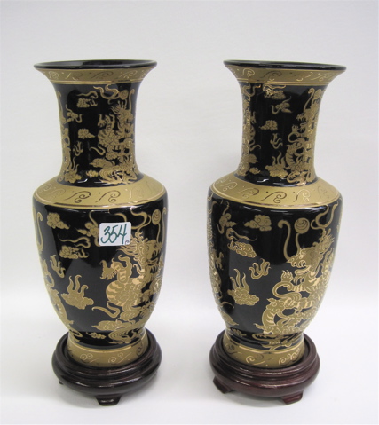 Appraisal: PAIR CHINESE PORCELAIN VASES gold dragon decoration on black ground