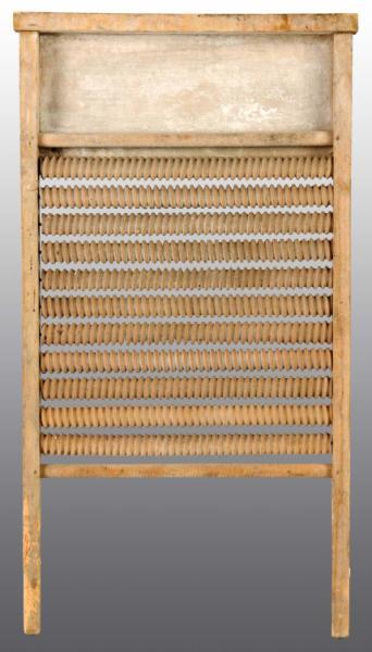 Appraisal: Washboard Description Mother Hubbard Carved wooden spools Condition Very Good