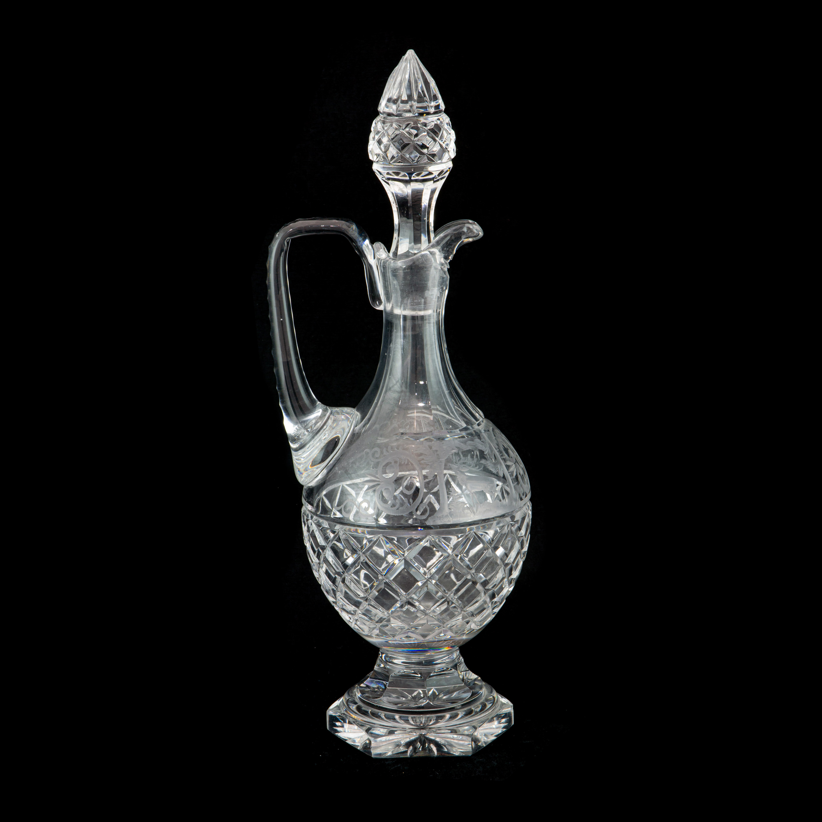 Appraisal: CONTINENTAL CUT AND ENGRAVED GLASS DECANTER Continental cut and engraved