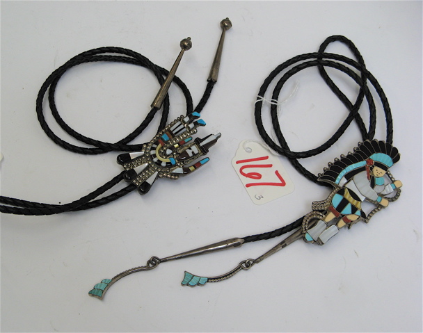 Appraisal: THREE ZUNI STERLING BOLO TIES on black leather cords with