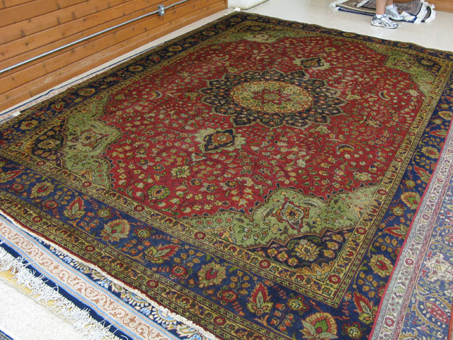 Appraisal: PERSIAN KASHANI TABRIZ CARPET floral and central floral medallion design