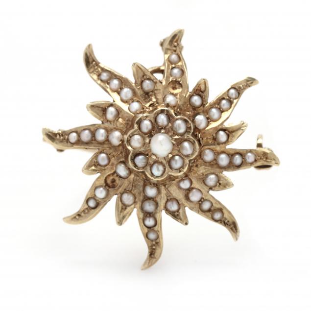 Appraisal: GOLD AND PEARL SUNBURST MOTIF PENDANT BROOCH Sunburst motif in