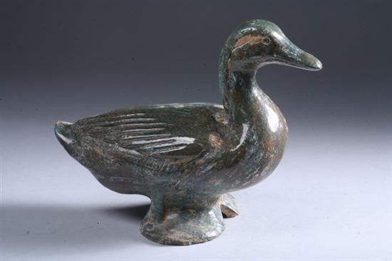 Appraisal: CHINESE GREENISH-BROWN POTTERY FIGURE OF DUCK - in long PROVENANCE