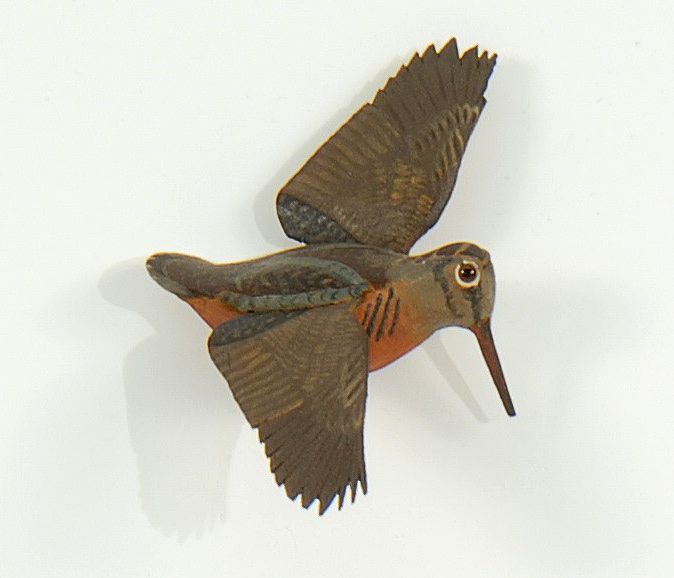 Appraisal: MINIATURE WOODCOCK In flying form By A J Dando of