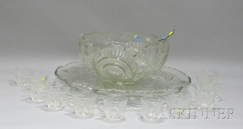 Appraisal: Colorless Pressed Glass Punch Bowl with Undertray and Twelve Cups