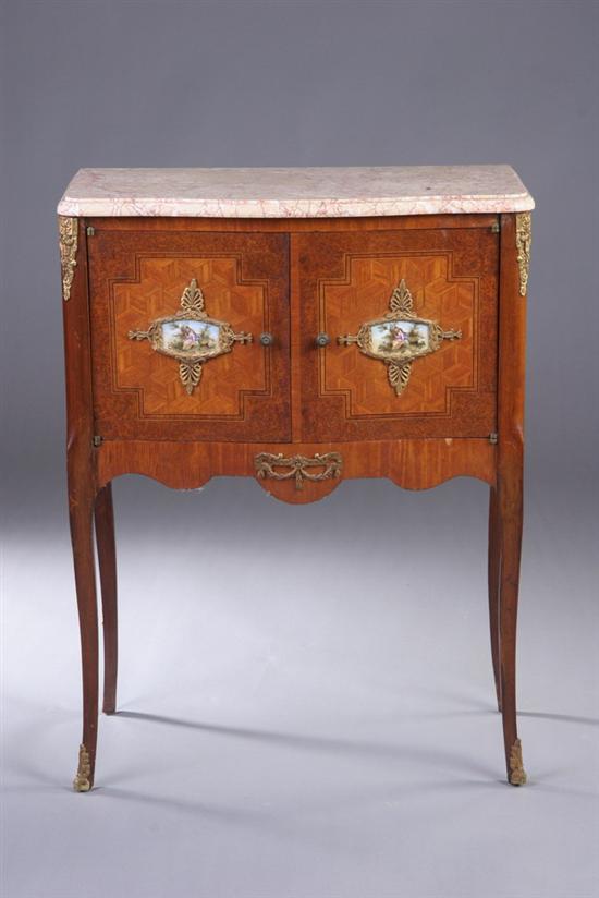 Appraisal: FRENCH TRANSITIONAL STYLE MARBLE-TOP COMMODE early th Serpentine slab two-drawer