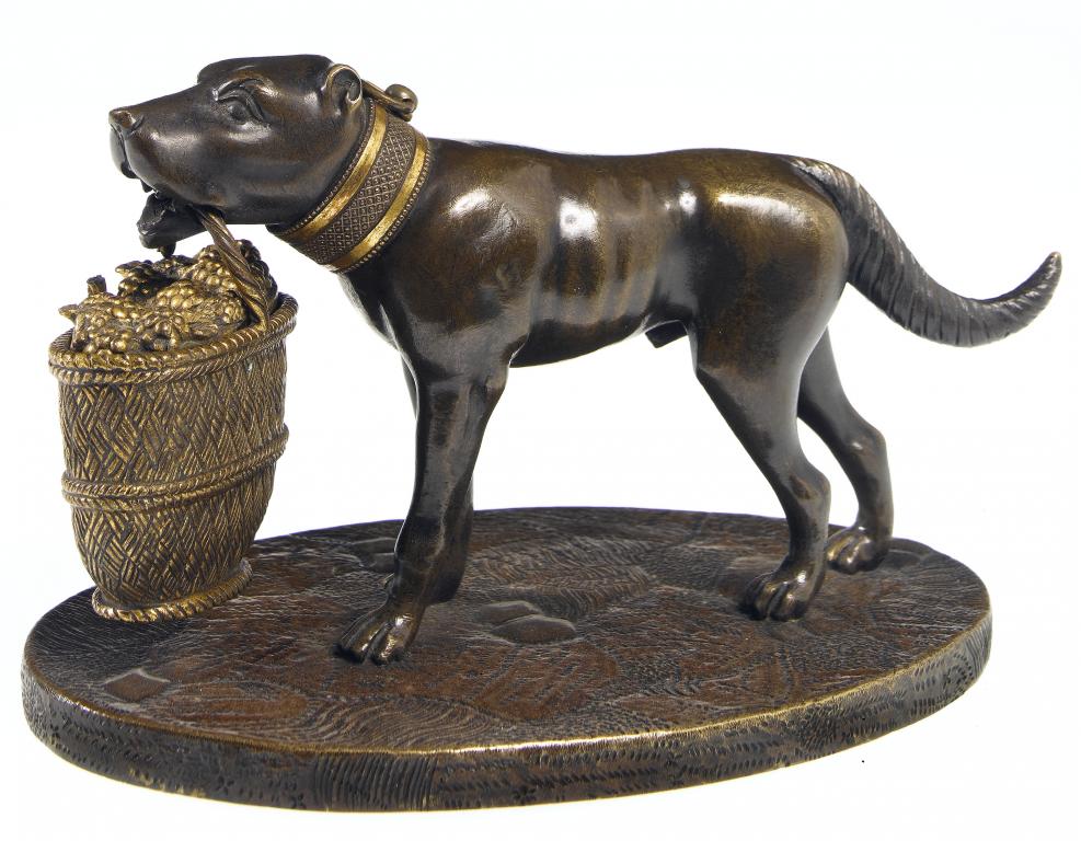 Appraisal: A FRENCH PARCEL GILT BRONZE MODEL OF A DOG carrying