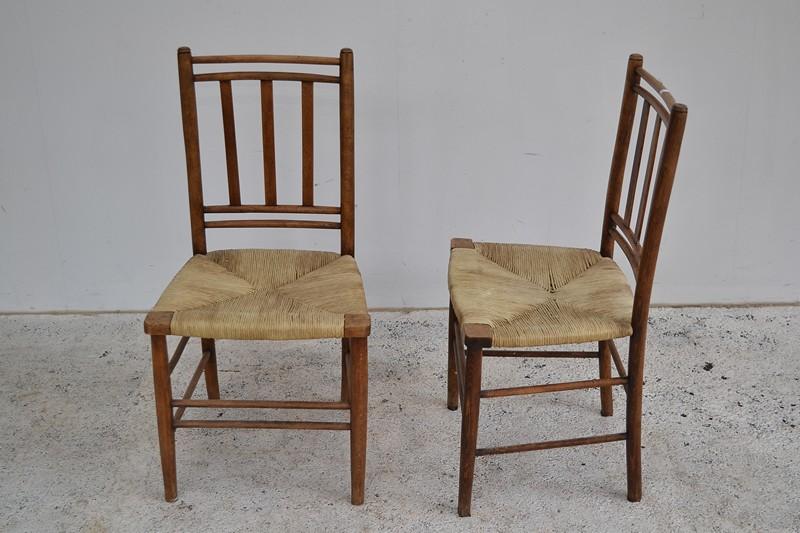 Appraisal: FOUR PROVINCIAL STYLE CHAIRS WITH RUSH SEATS A SET OF