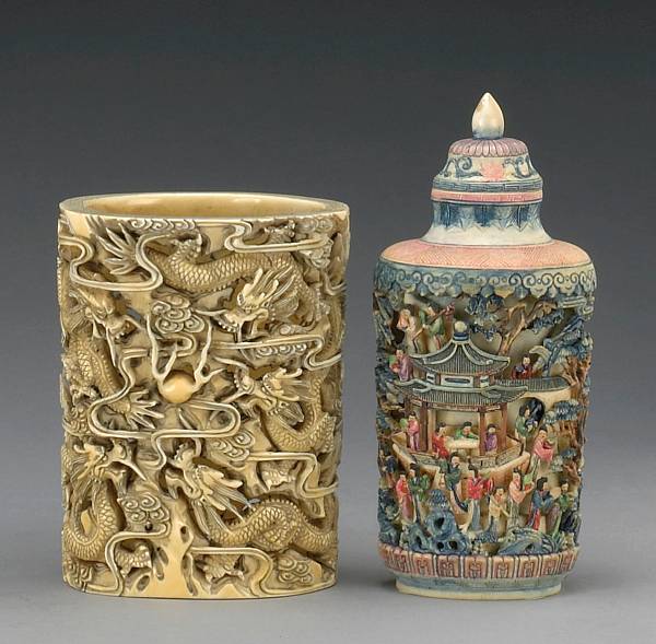 Appraisal: A group of two tinted ivory carvings th Century The