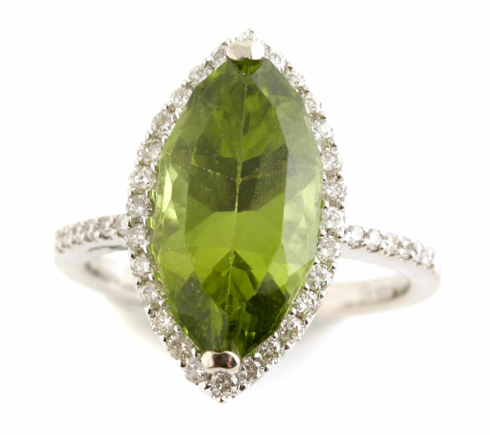 Appraisal: Property of another owner A peridot diamond and k white