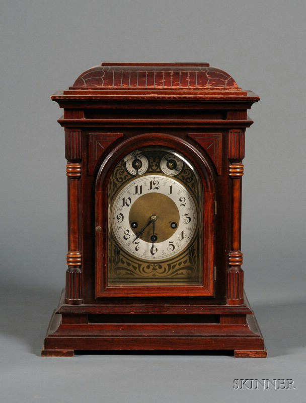 Appraisal: German Mahogany Mantel Clock early th century dial flanked by