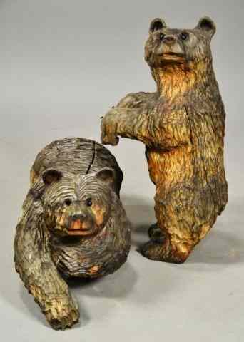 Appraisal: HAND CARVED WOODEN BLACK BEARSIncluding two carved bears one standing