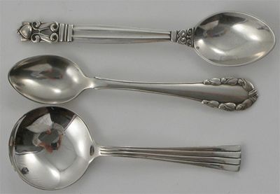 Appraisal: A Georg Jensen Acorn condiment silver spoon cast in low