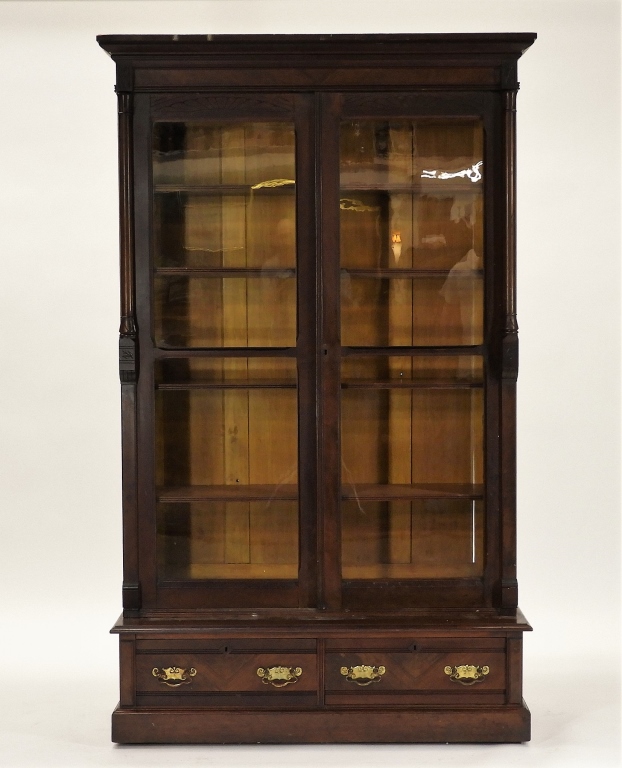 Appraisal: VICTORIAN BLACK WALNUT STEP BACK BOOKCASE CABINET United States Circa