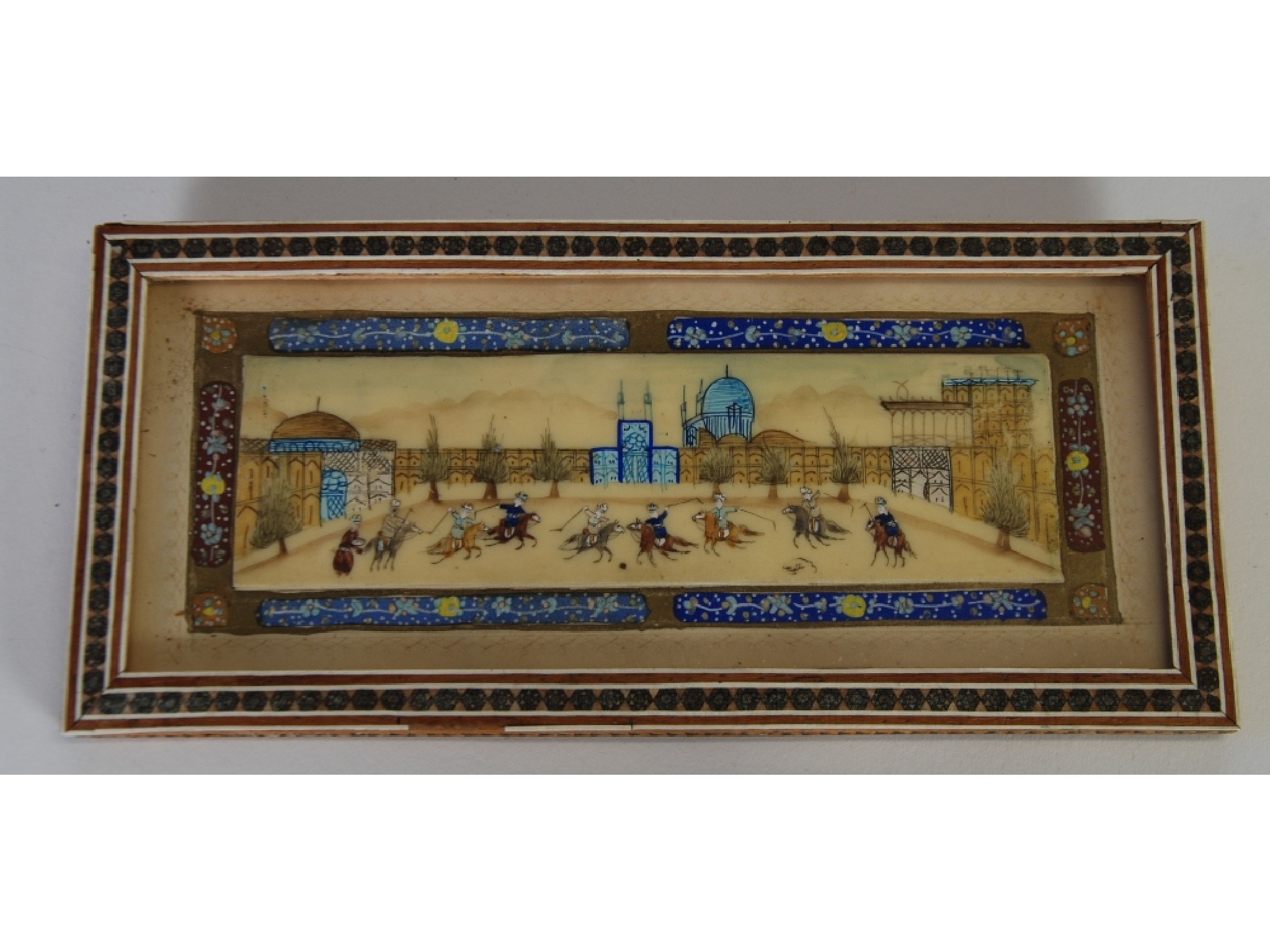 Appraisal: A PERSIAN MINIATURE PAINTING ON IMITATION IVORY POLO MATCH OUTSIDE