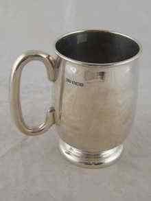 Appraisal: A substantial silver barrel shaped tankard Sheffield ht cm wt