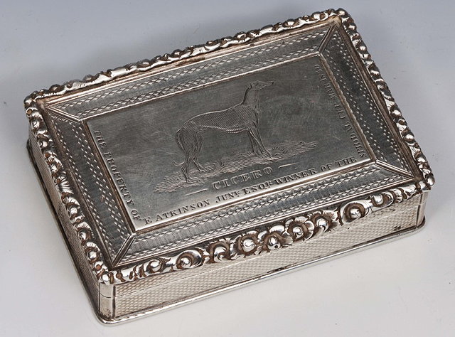 Appraisal: A GEORGE III SILVER SNUFF BOX engraved with a greyhound