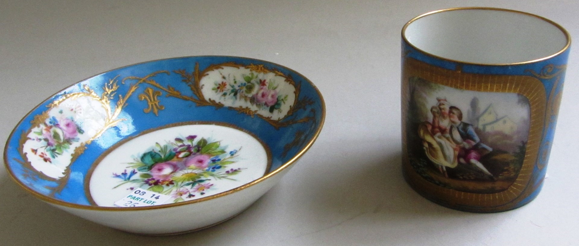 Appraisal: A Sevres style blue ground cup and a saucer late