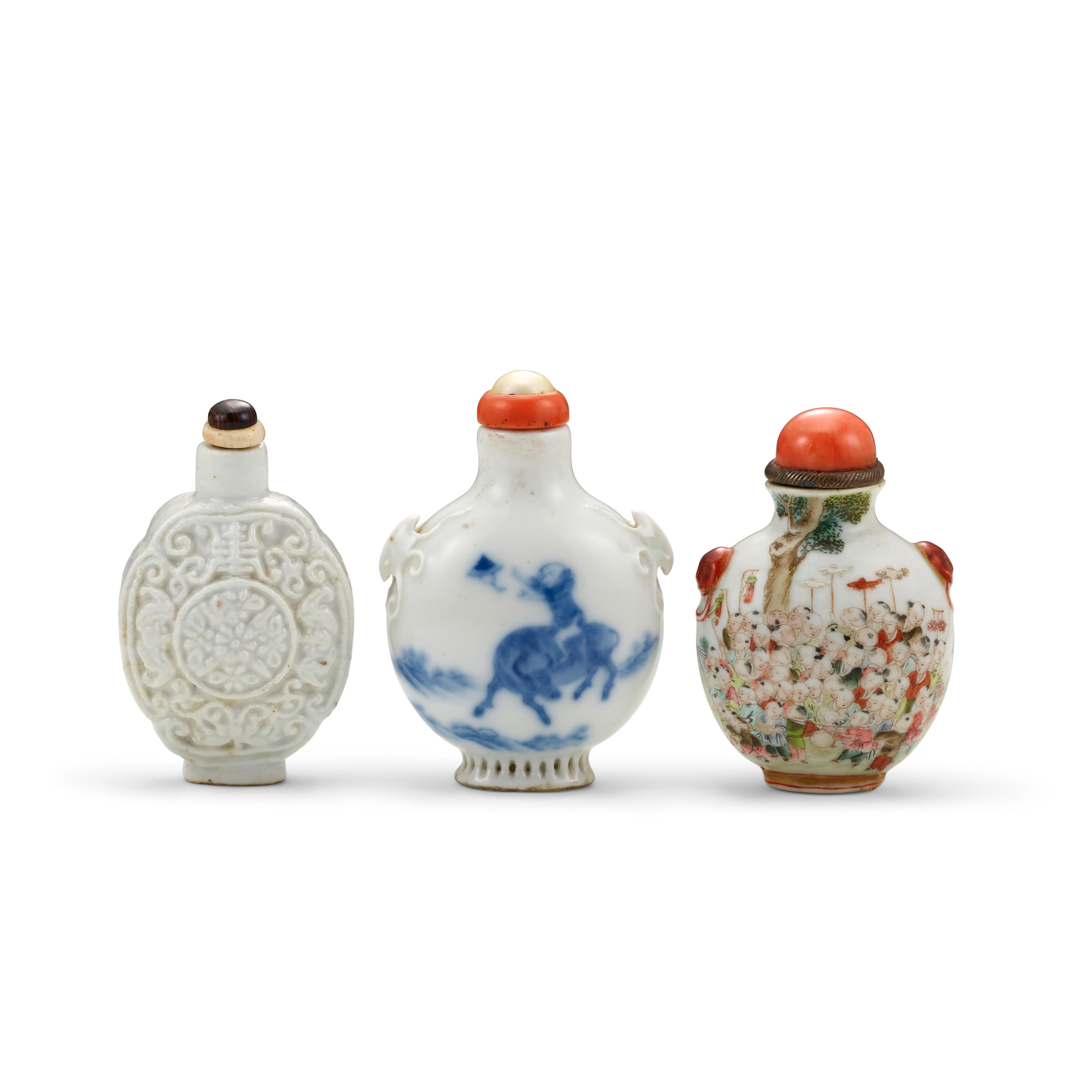 Appraisal: THREE PORCELAIN SNUFF BOTTLES - - The first a flattened