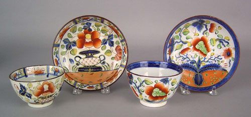 Appraisal: Two Gaudy Dutch cups and saucers th c in the