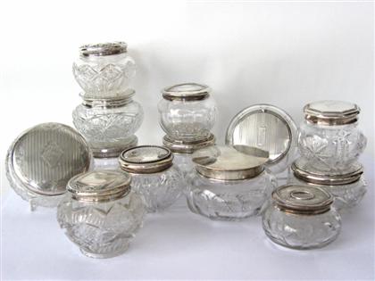 Appraisal: Group of cut and etched glass powder jarsHaving silver lids