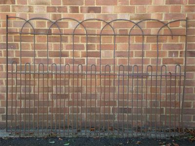 Appraisal: Six wrought iron painted railing panels with arched tops approx